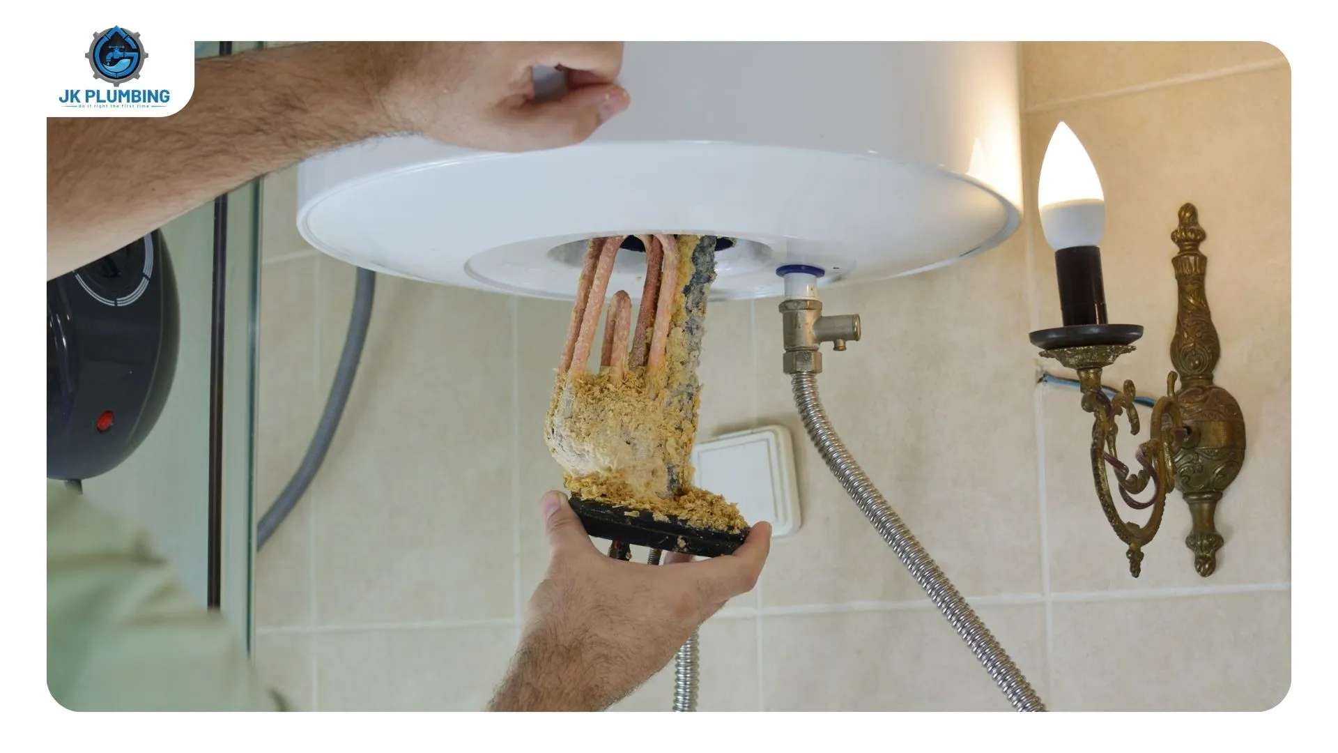 JK Plumbing plumber running an error-code diagnostic on a wall-mounted tankless water heater in a Sunset District utility closet