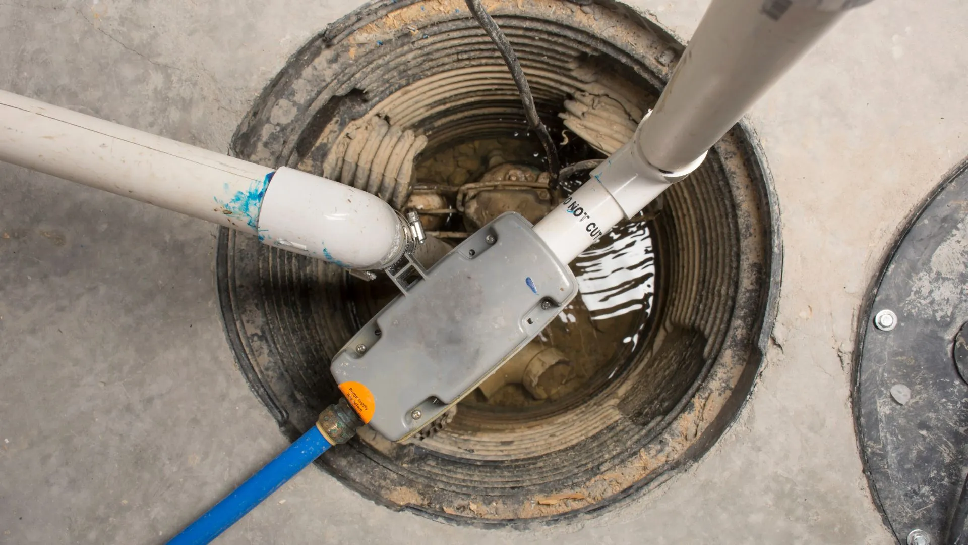 JK Plumbing technician running a sewer camera survey at a Palo Alto property