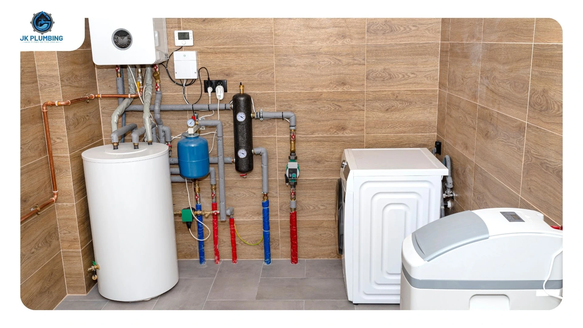 Hand closing the cold water inlet valve clockwise on top of a leaking water heater