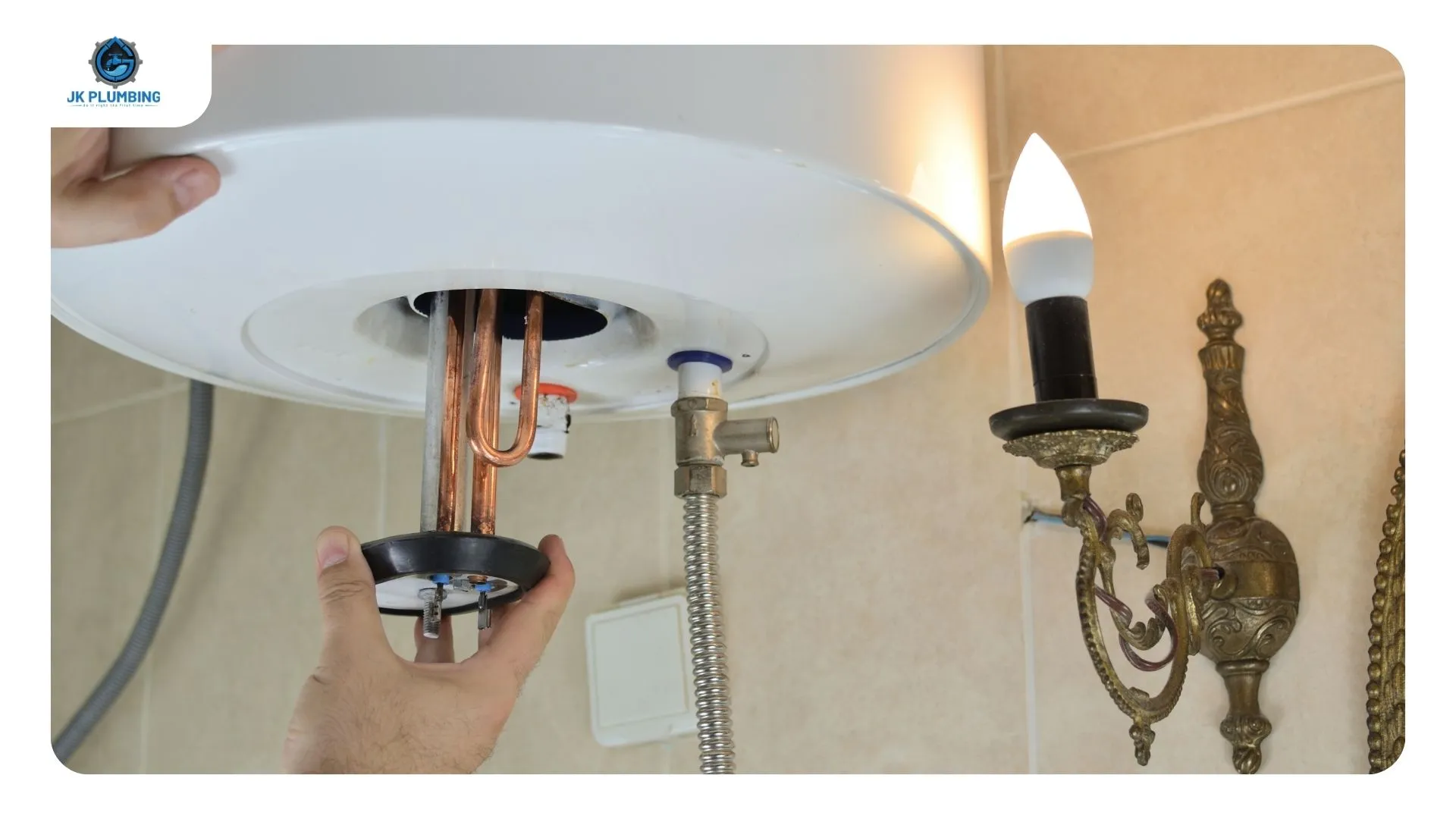 Thermocouple and pilot assembly being serviced on a gas water heater that stopped heating